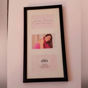 A three 3.5 × 2.5 inch- 9×6 cm photo frame, brand new still in package